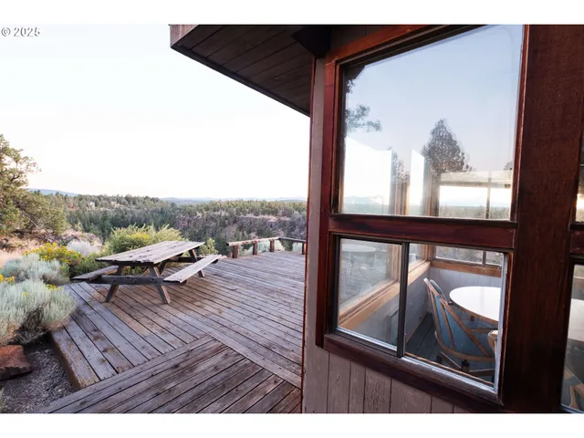 a view of balcony with furniture