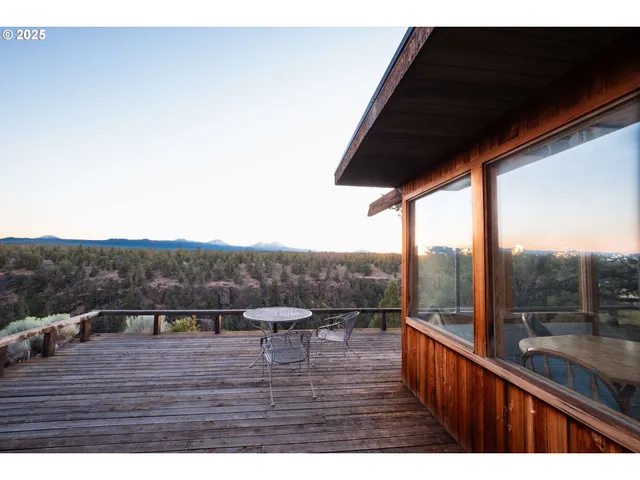a view of patio with wooden floor