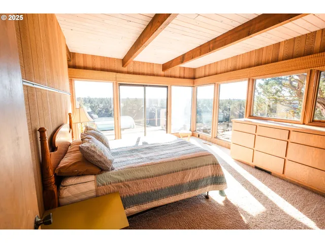 a kitchen with stainless steel appliances granite countertop a sink stove and wooden cabinets