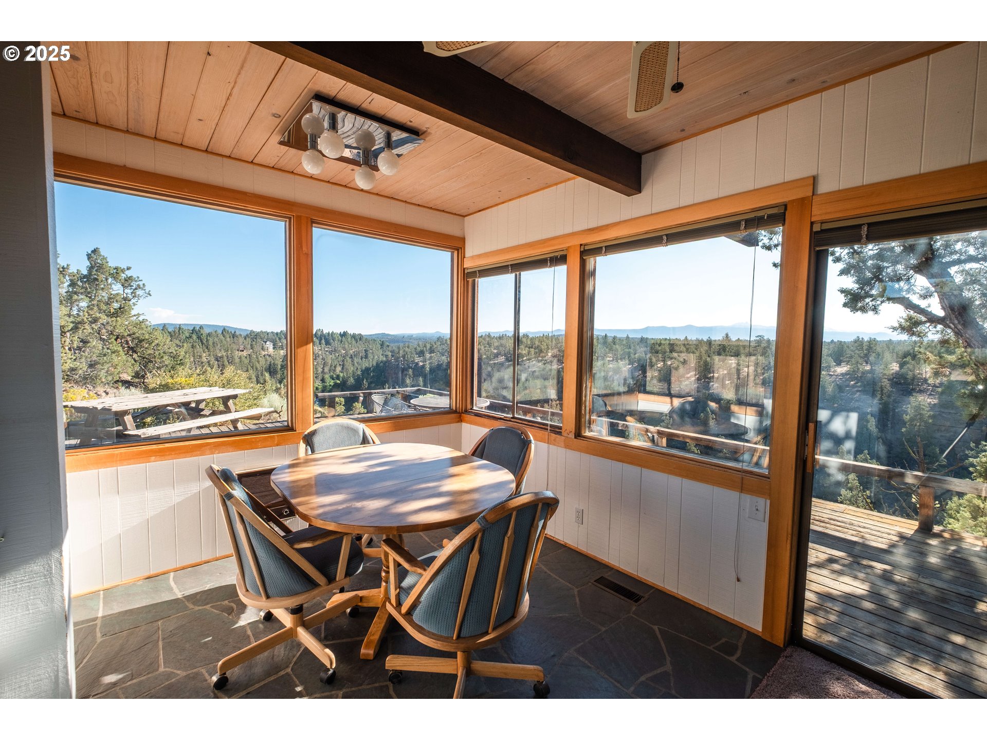 65255 Swalley Road Bend, OR 97703 - Photo 45 of 48 a dining room with furniture window and outside view