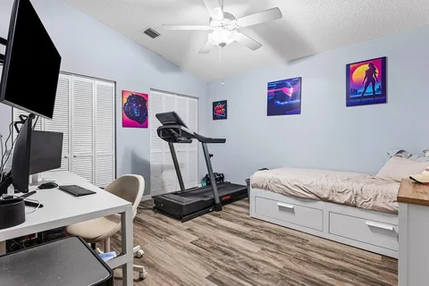 a room with furniture and a flat screen tv