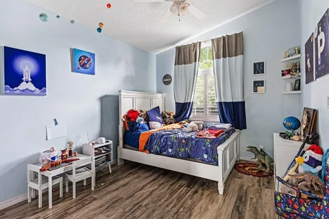 a bedroom with furniture and a bed