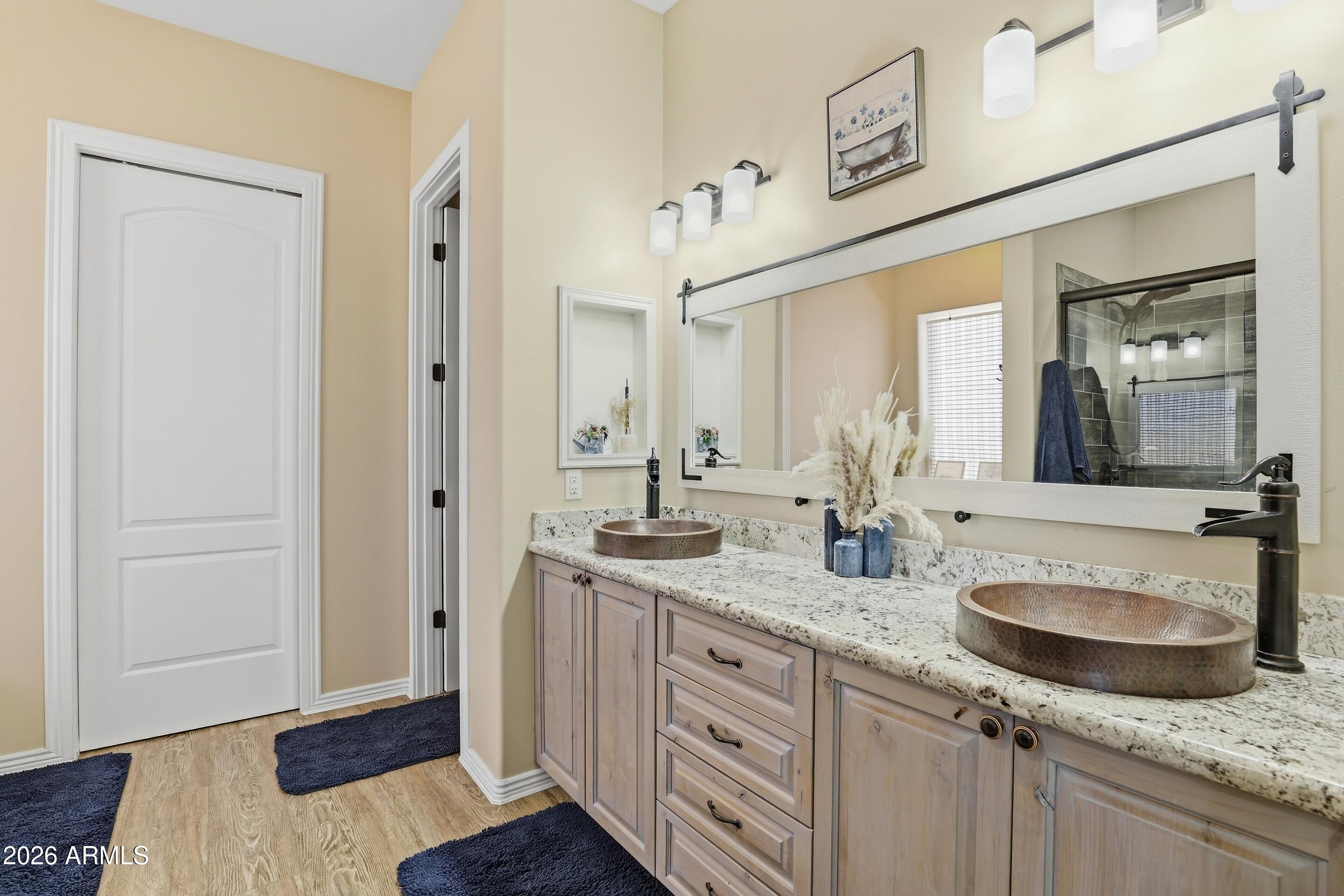 1206 East Bolivar Street Payson, AZ 85541 - Photo 14 of 43 a bathroom with a granite countertop double vanity sink and a mirror