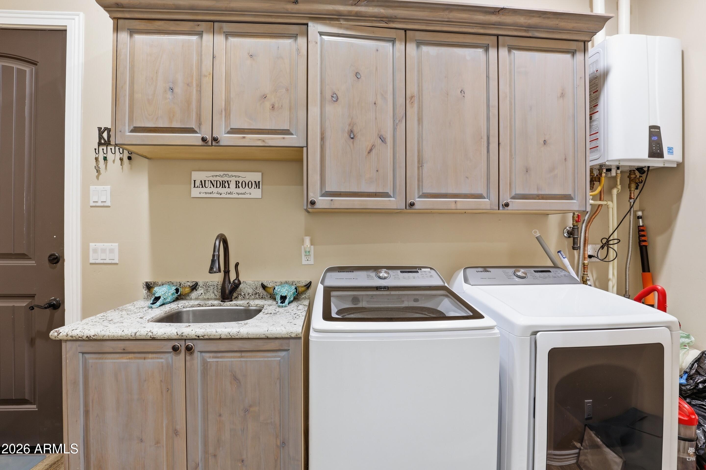 1206 East Bolivar Street Payson, AZ 85541 - Photo 20 of 43 a utility room with dryer and washer