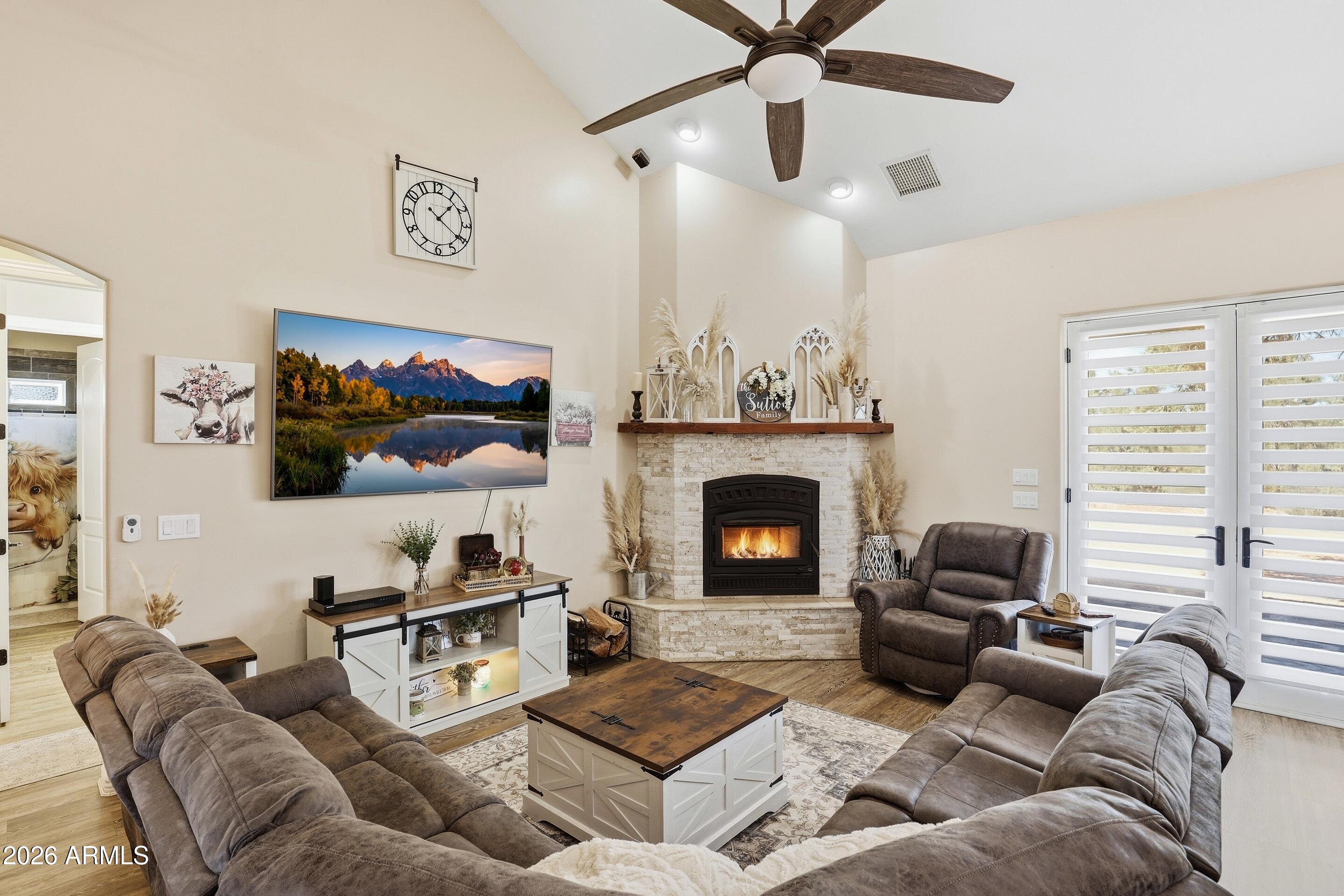 1206 East Bolivar Street Payson, AZ 85541 - Photo 2 of 43 a living room with furniture and a fireplace