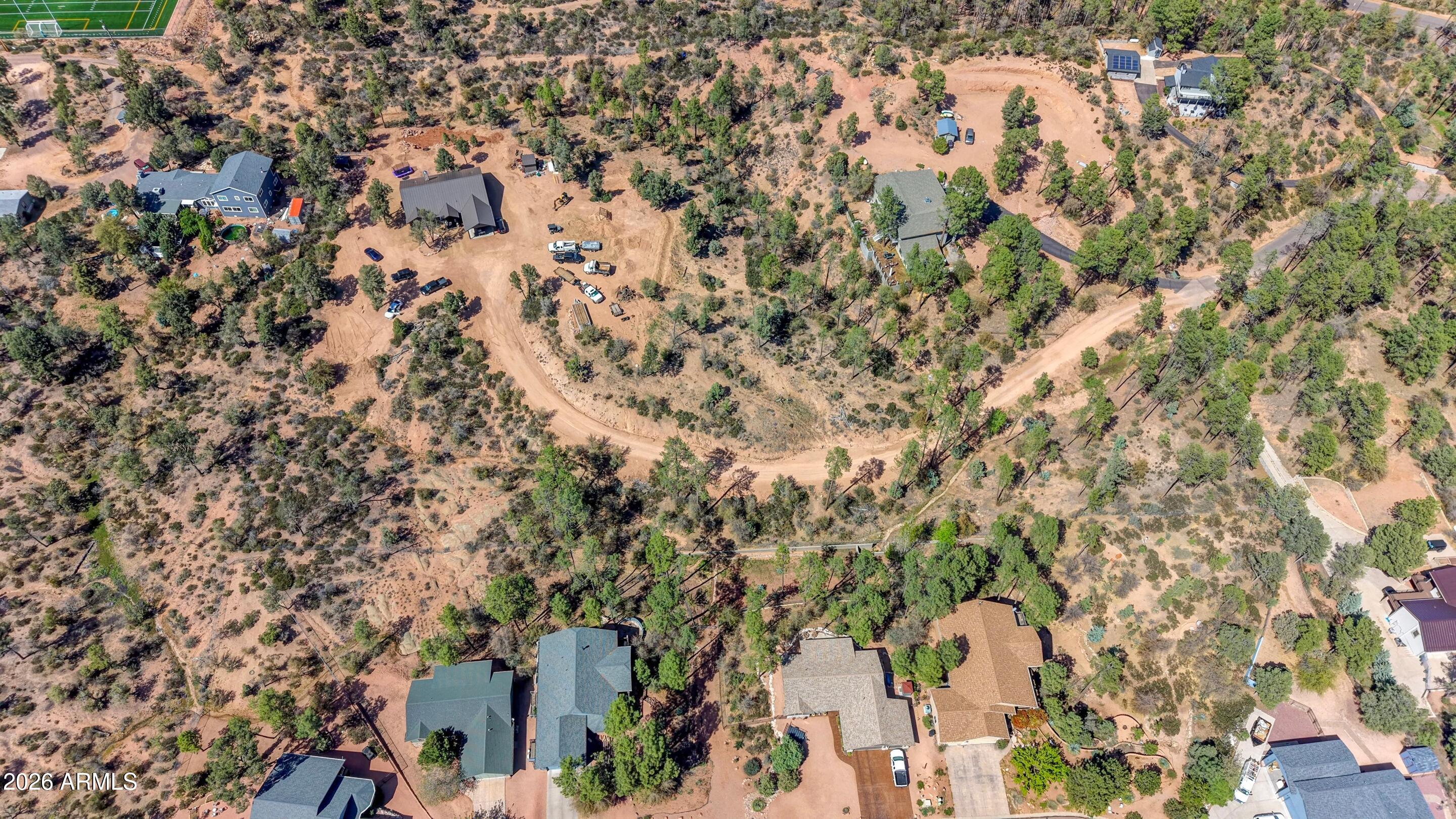 1206 East Bolivar Street Payson, AZ 85541 - Photo 31 of 43 an aerial view of residential house with parking space
