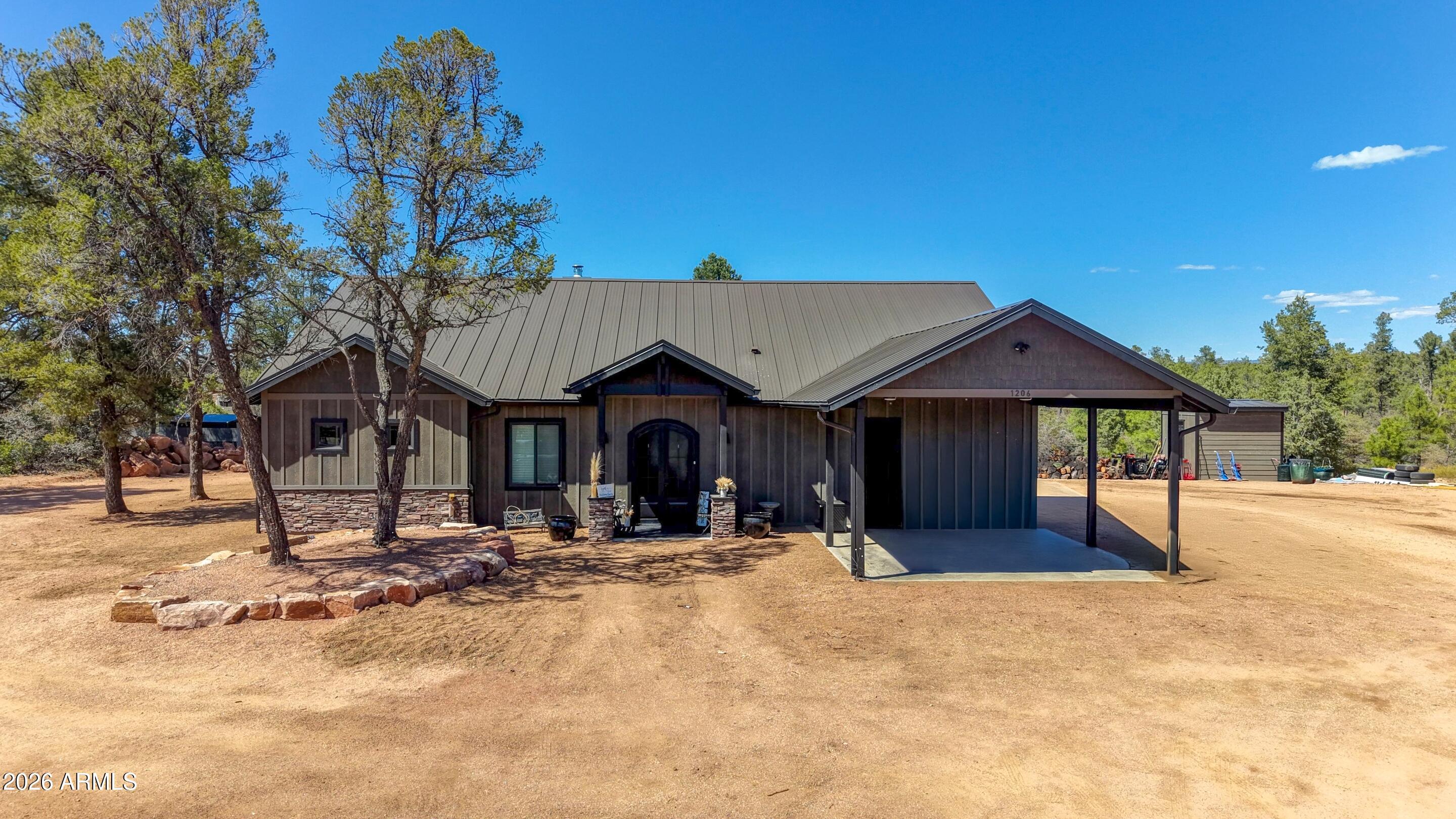 1206 East Bolivar Street Payson, AZ 85541 - Photo 38 of 43 a view of a house with a yard