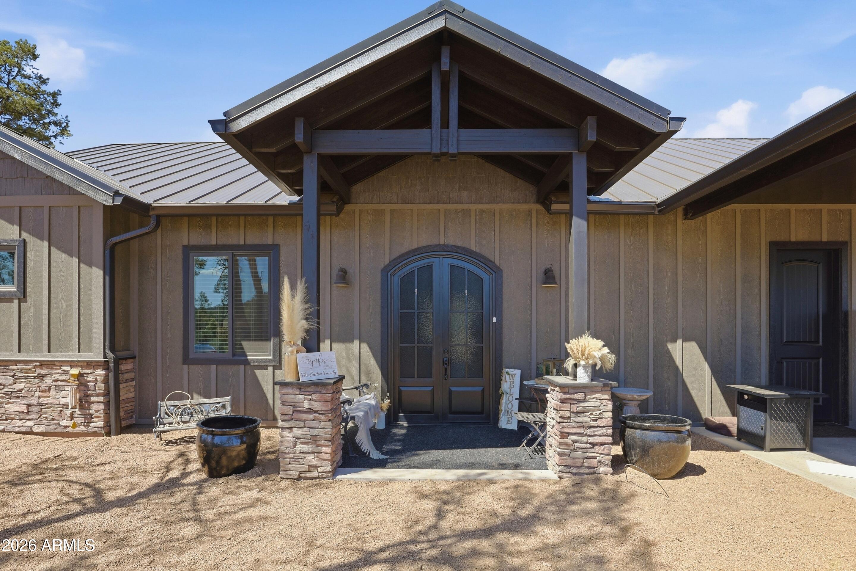 1206 East Bolivar Street Payson, AZ 85541 - Photo 40 of 43 a front view of a house with outdoor seating