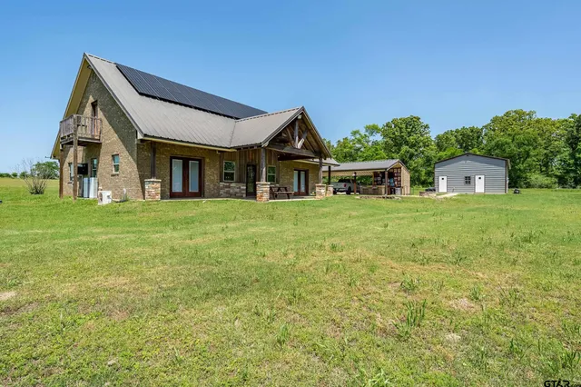 a house view with a outdoor space