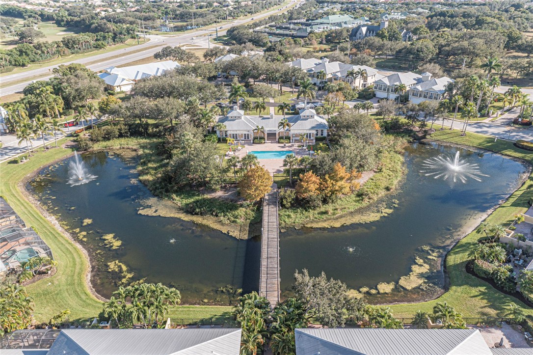 1835 Bridgepointe Circle, Unit 18 Vero Beach, FL 32967 - Photo 30 of 34 an aerial view of residential houses with outdoor space