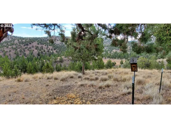 a view of a mountain with a outdoor space