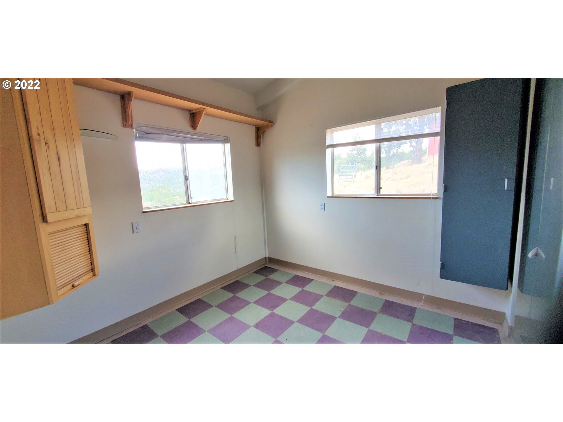 18990 Southeast Doubtful Dirt Road Prineville, OR 97754 - Photo 31 of 32 a view of an empty room with a window