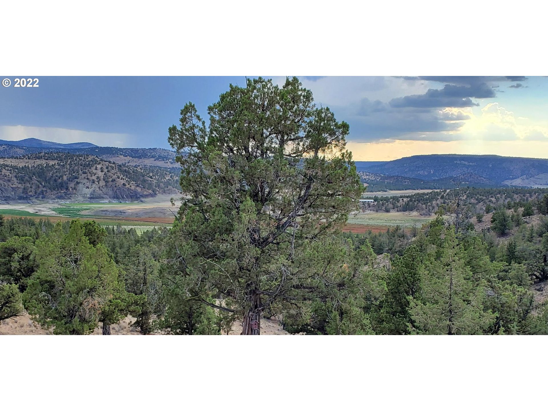 18990 Southeast Doubtful Dirt Road Prineville, OR 97754 - Photo 8 of 32 a view of a sunset