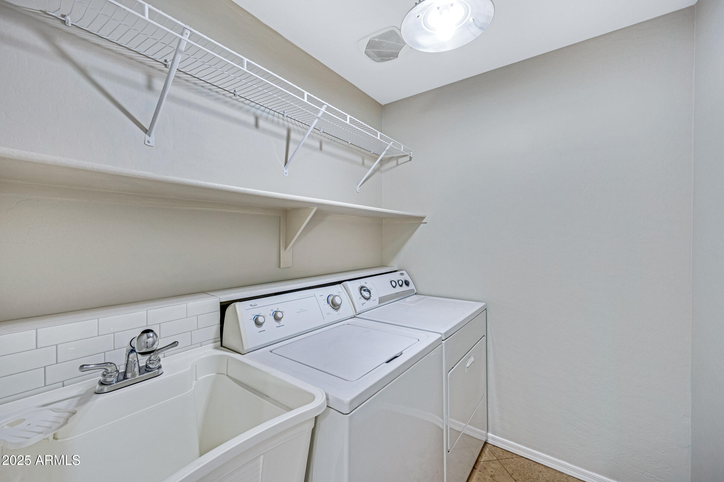 2315 East Pecan Road Phoenix, AZ 85040 - Photo 33 of 36 a utility room with dryer and washer