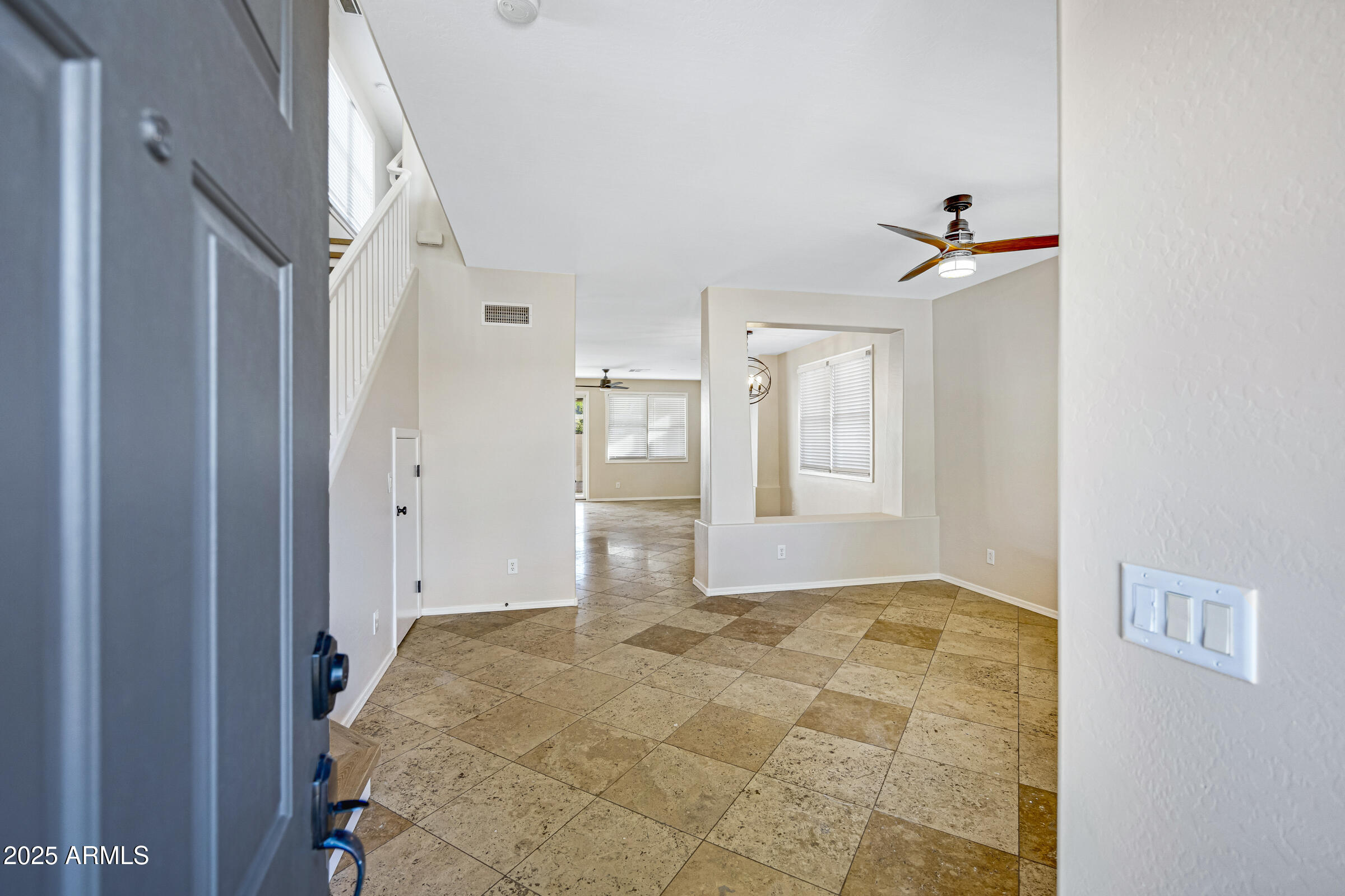 2315 East Pecan Road Phoenix, AZ 85040 - Photo 5 of 36 a bedroom with a bed and a window