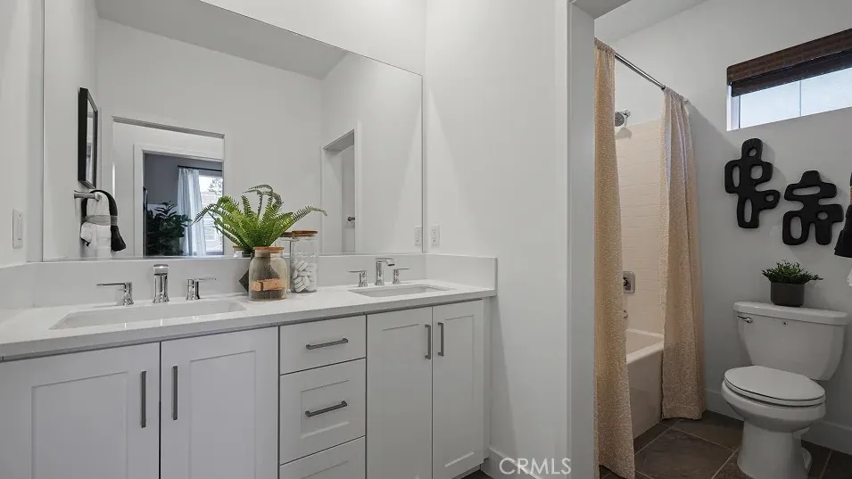 1025 Citron Road Fullerton, CA 92835 - Photo 16 of 25 a bathroom with a toilet sink and mirror