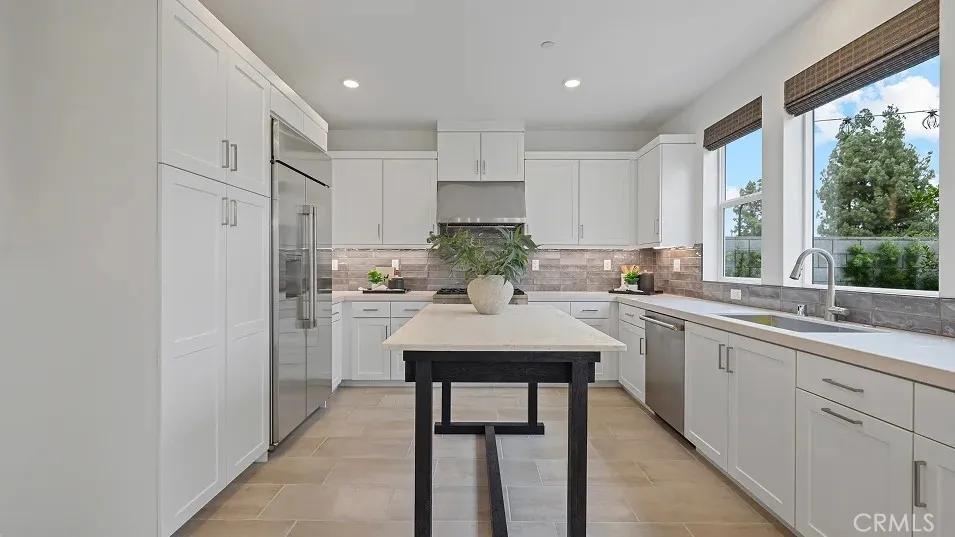 1025 Citron Road Fullerton, CA 92835 - Photo 2 of 25 a kitchen with white cabinets and white appliances