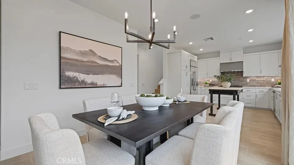 1025 Citron Road Fullerton, CA 92835 - Photo 3 of 25 a living room with stainless steel appliances kitchen island a table and chairs