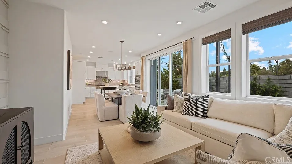 1025 Citron Road Fullerton, CA 92835 - Photo 6 of 25 a living room with fireplace furniture and a potted plant