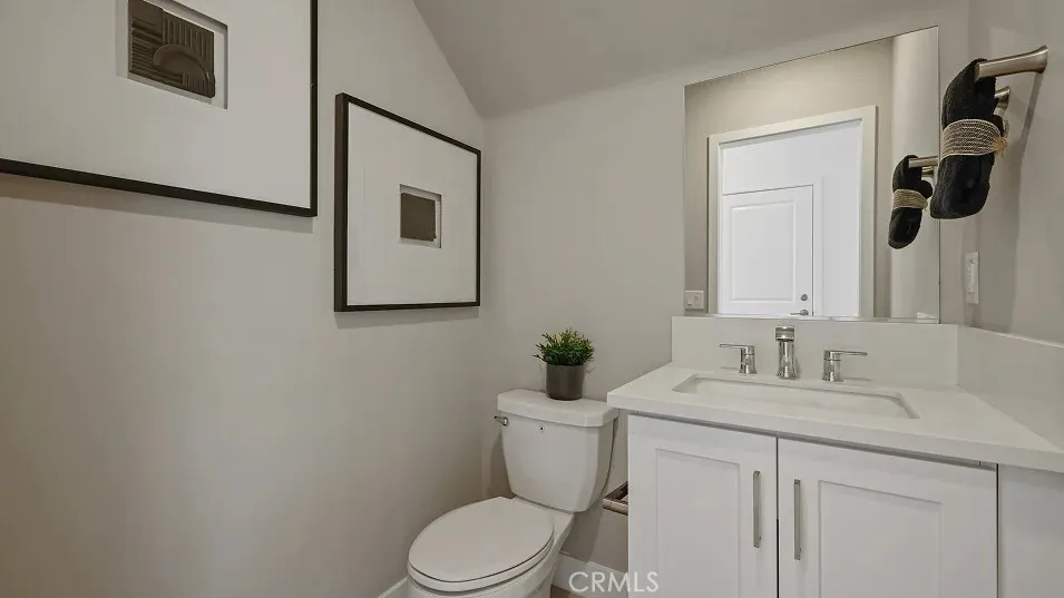 1025 Citron Road Fullerton, CA 92835 - Photo 9 of 25 a bathroom with a toilet sink and mirror
