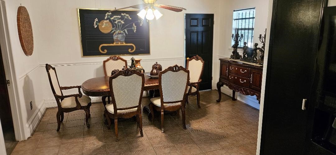 146 Hohldale Street Houston, TX 77022 - Photo 9 of 31 a dining room with furniture and wooden floor