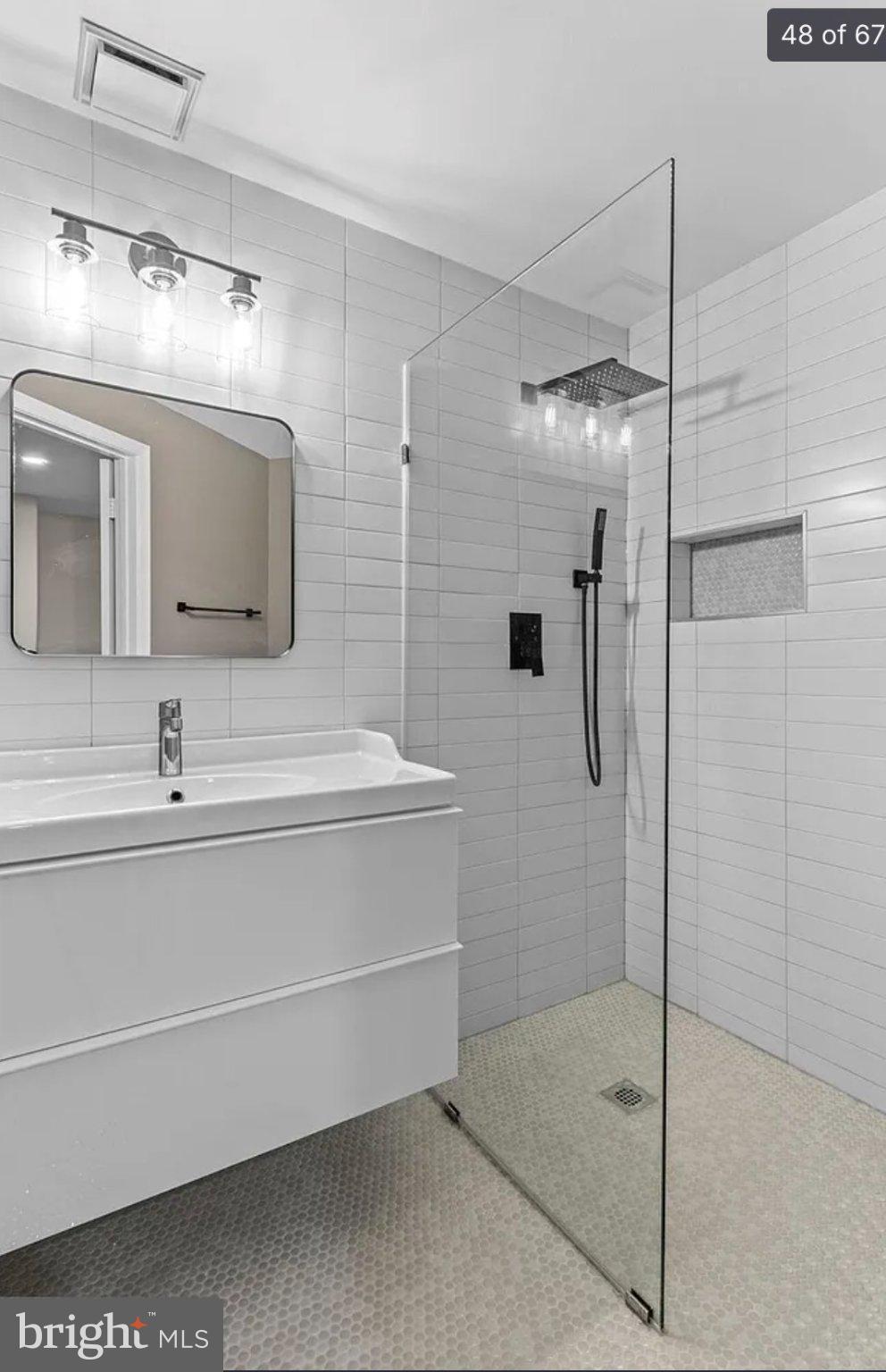 3906 Valley Ridge Drive Fairfax, VA 22033 - Photo 46 of 58 Sleek modern bathroom oasis.