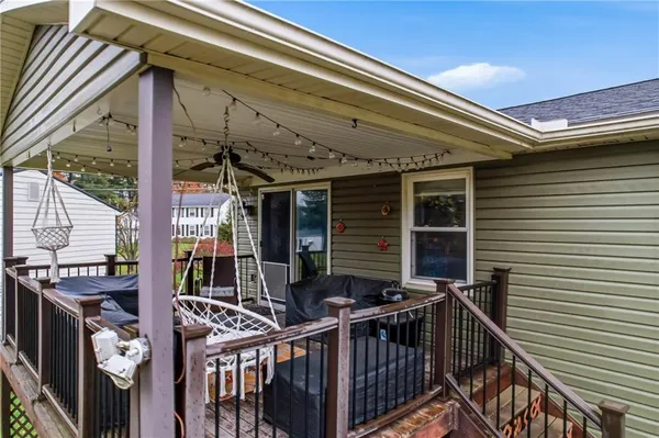 a view of a two chairs in the deck