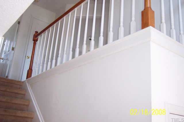 3609 Christine Court Raleigh, NC 27604 - Photo 6 of 12 a view of staircase with rug