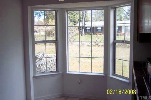 3609 Christine Court Raleigh, NC 27604 - Photo 9 of 12 a view of an empty room with a window