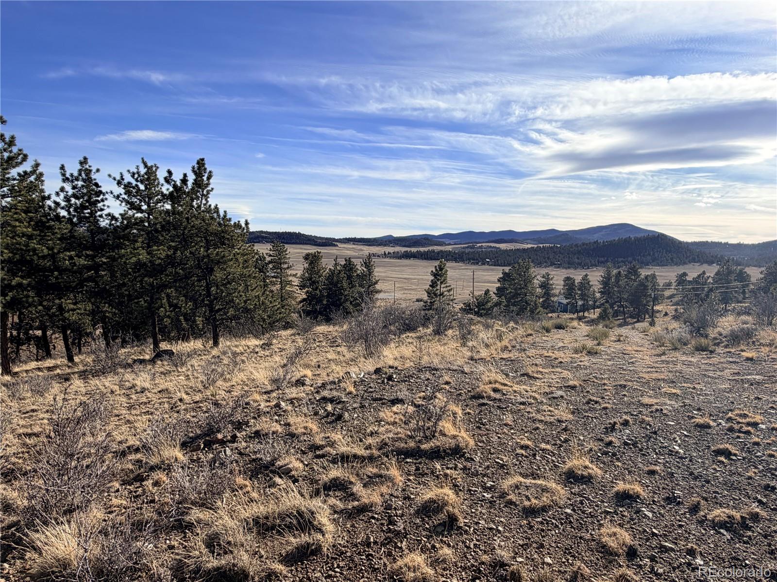 729 Bridle Path Hartsel, CO 80449 - Photo 10 of 24 a view of a lake with a mountain in the background