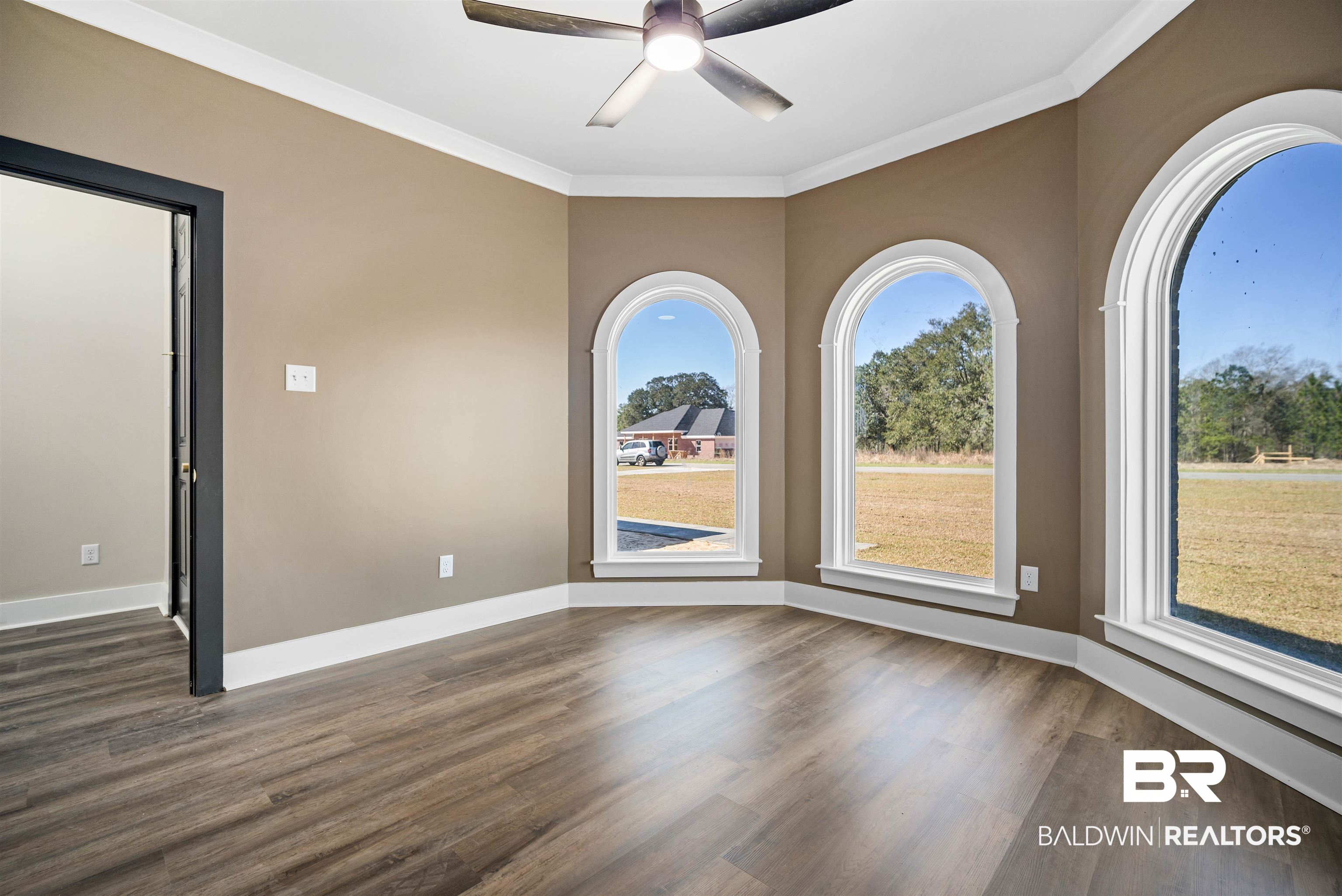 188 Hampton Ridge Mobile, AL 36608 - Photo 14 of 37 Office featuring ornamental molding, and ceiling fan. 3 large circle top windows.