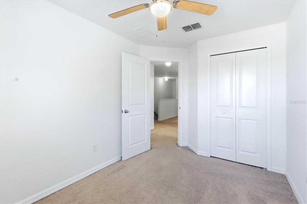 12909 Dream Catcher Way Riverview, FL 33579 - Photo 22 of 32 an empty room with a bathroom