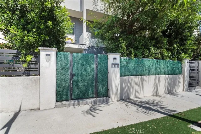 a view of a entrance gate of a house
