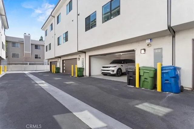 a view of a street with cars