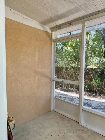 a view of a room with a large window