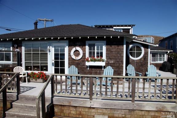 a front view of a house with swimming pool