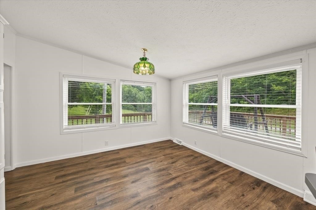 938 Riley Creek Road Whitleyville, TN 38588 - Photo 12 of 40 a view of an empty room with a window