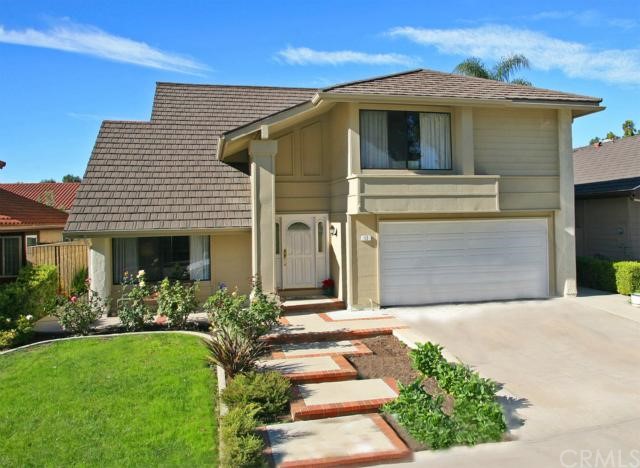 12 Palmatum Irvine, CA 92620 - Photo 1 of 1 a front view of a house with garden