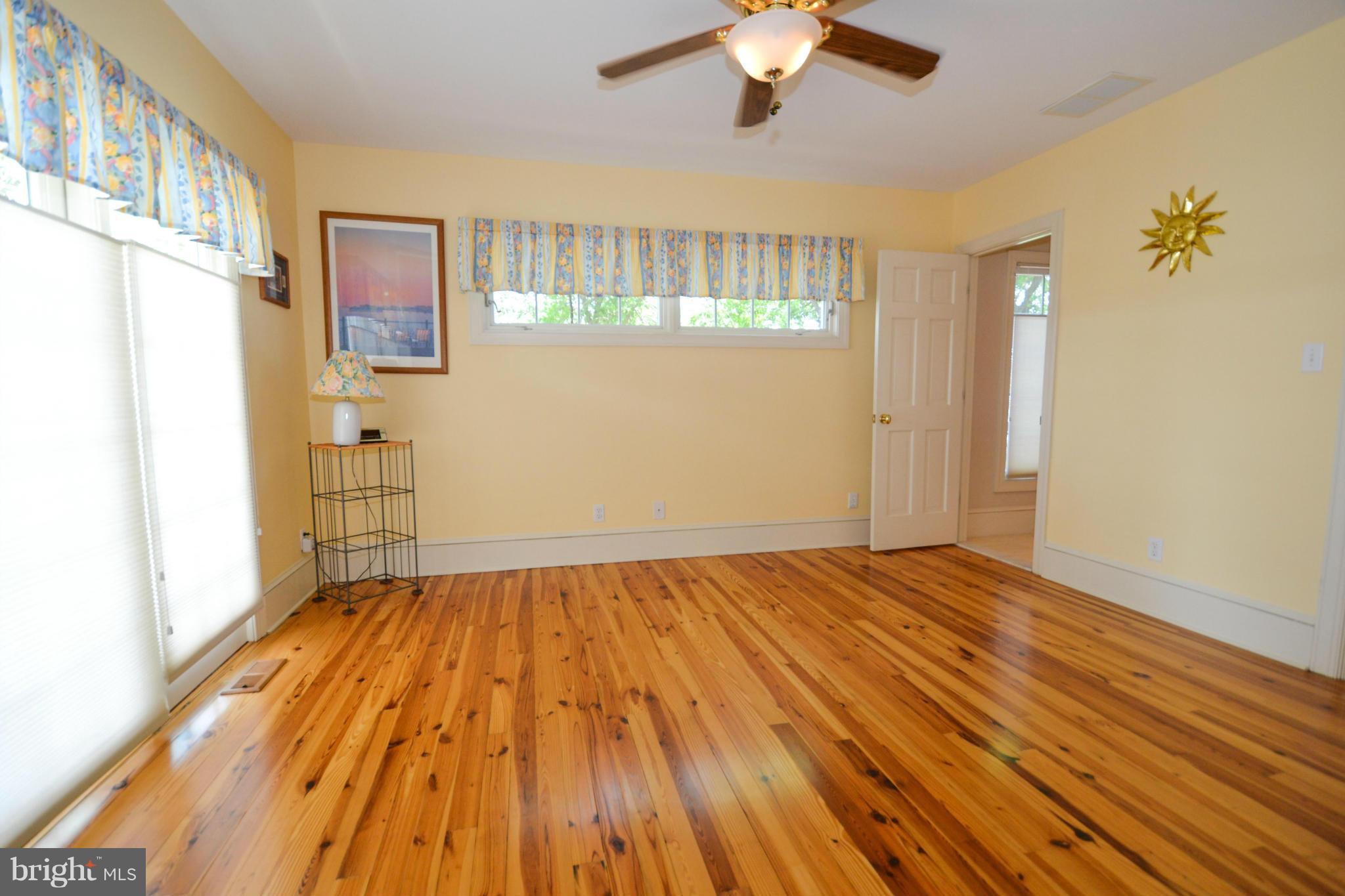 4999 West Chalk Point Road West River, MD 20778 - Photo 23 of 30 1st floor bedroom w/ attached bath