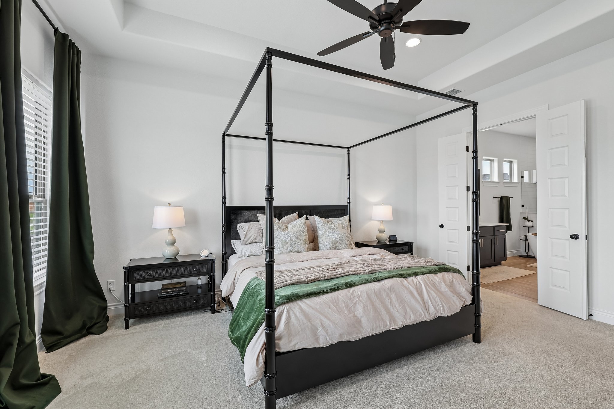 130 Firethorn Loop Bastrop, TX 78602 - Photo 19 of 38 Carpeted bedroom with a tray ceiling and ceiling fan