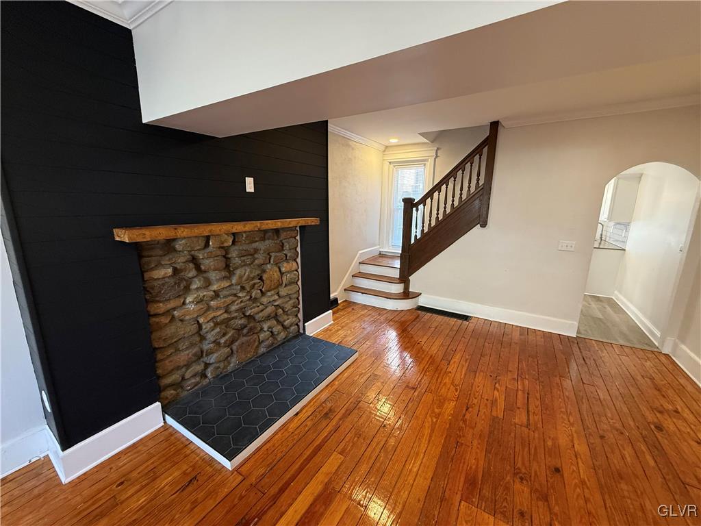 32 Easton Road Nazareth, PA 18064 - Photo 19 of 47 a view of a livingroom with wooden floor and staircase