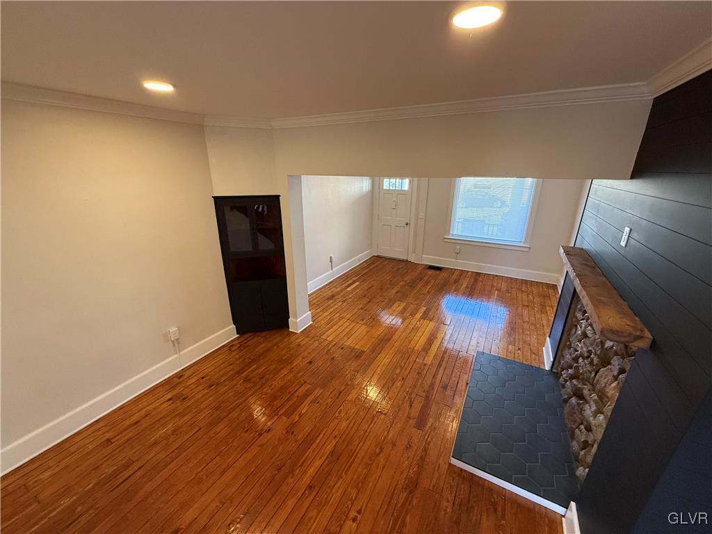 32 Easton Road Nazareth, PA 18064 - Photo 21 of 47 a view of a livingroom with wooden floor and a ceiling fan