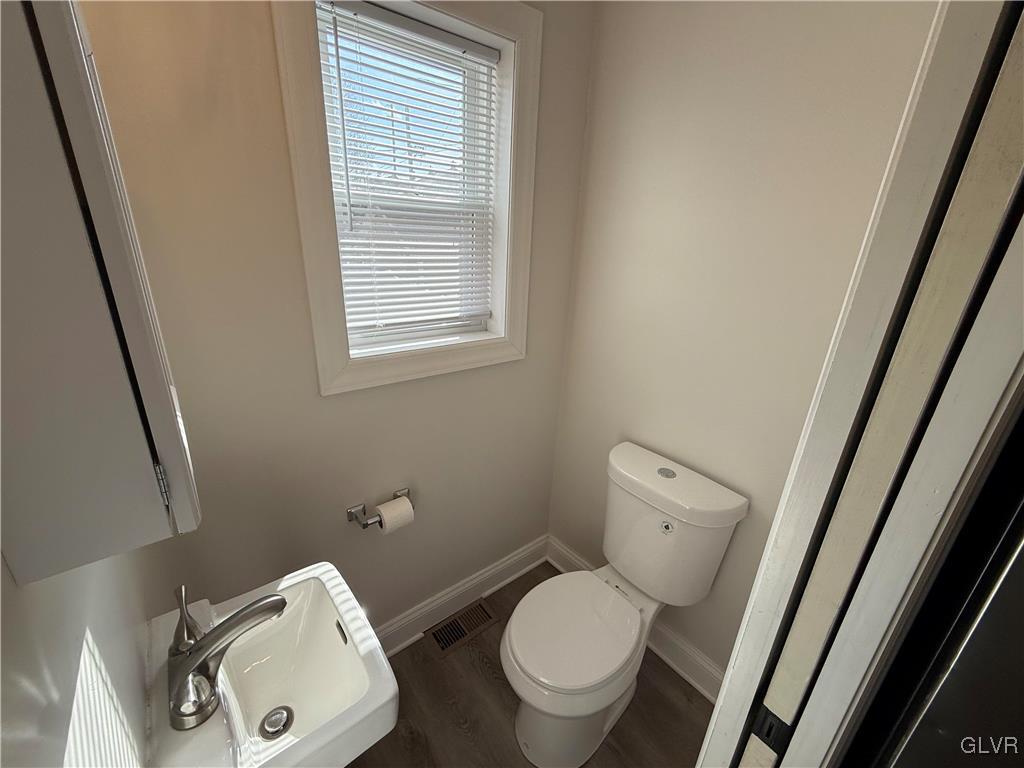 32 Easton Road Nazareth, PA 18064 - Photo 9 of 47 a white toilet sitting next to a small sink