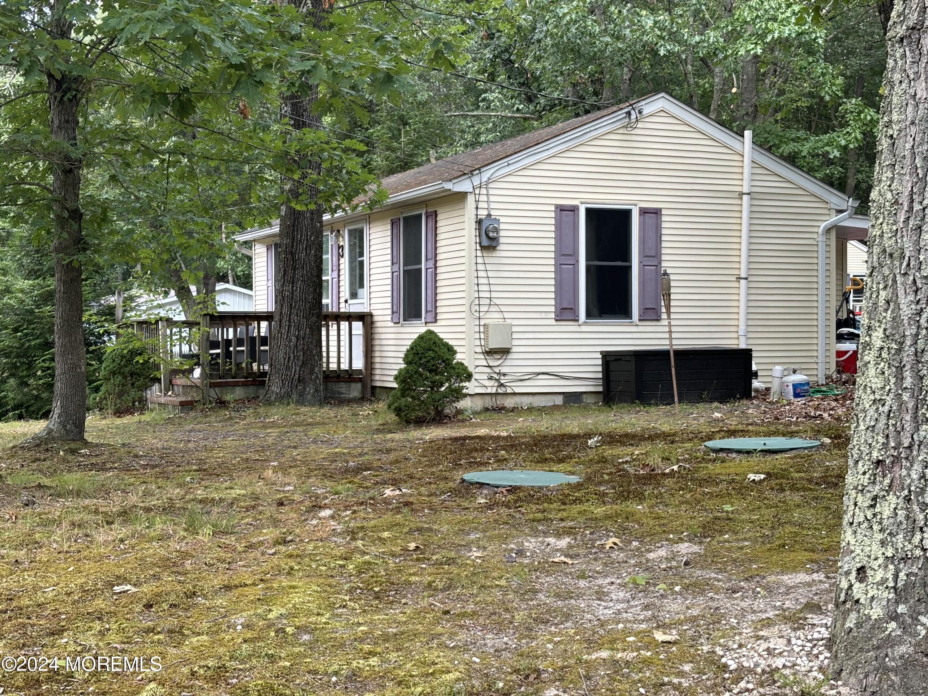 5 Francis Mills Road Freehold, NJ 07728 - Photo 2 of 8 a view of a house with backyard