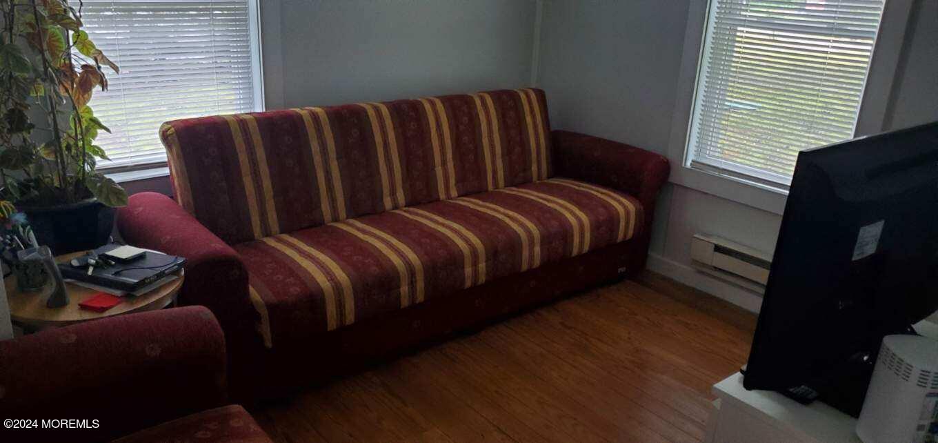 5 Francis Mills Road Freehold, NJ 07728 - Photo 6 of 8 a bedroom with bed and wooden floor