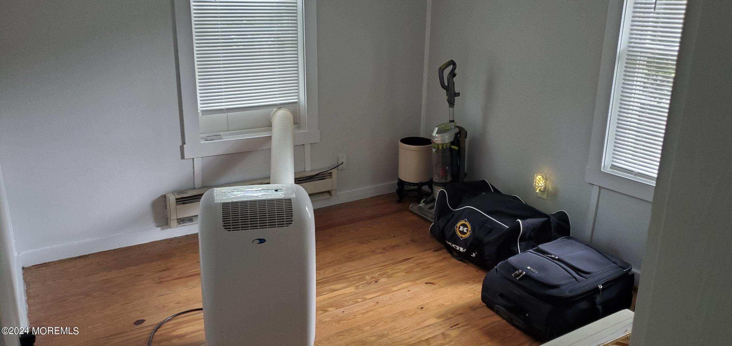 5 Francis Mills Road Freehold, NJ 07728 - Photo 7 of 8 a view of workspace with wooden floor