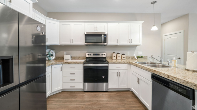 1810 West 300th Street South, Unit D Mapleton, UT 84664 - Photo 14 of 30 Kitchen with stainless steel appliances