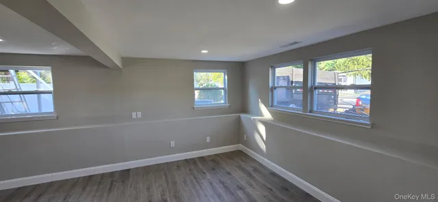 an empty room with windows