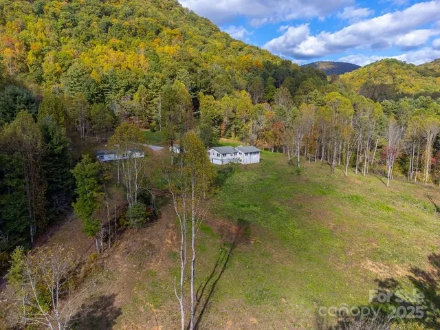 a view of a lake with a building in the background