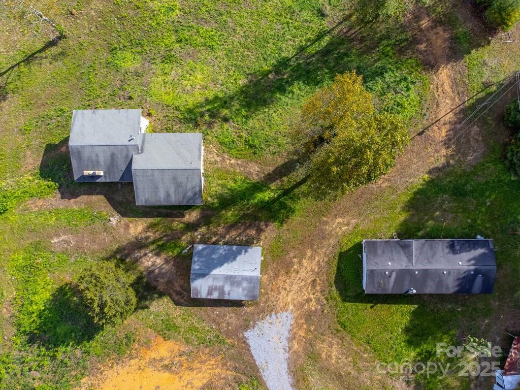 8125 Ellijay Road Franklin, NC 28734 - Photo 29 of 35 an aerial view of a house with garden space and street view